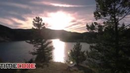دانلود استوک فوتیج : دریاچه در غروب خورشید Lake Sunset Fly Through