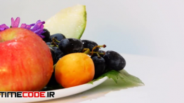 دانلود استوک فوتیج : میوه در بشقاب Rotating Fruit Platter