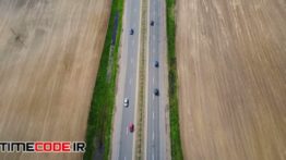 دانلود استوک فوتیج : عبور و مرور ماشین ها در جاده Aerial Drone Shot Of Empty Motorway