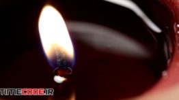 دانلود استوک فوتیج : نما بسته از شعله شمع Candle Flame Burning Macro
