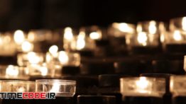 دانلود استوک فوتیج : شمع Candles Lit In Remembrance At Church