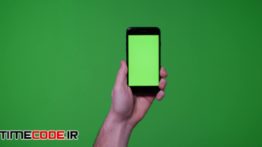 دانلود استوک فوتیج : پرده سبز موبایل Smart Phone Device On Green Screen