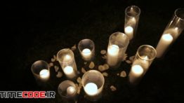 دانلود استوک فوتیج : نما بالا از شمع ها