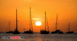 دانلود عکس استوک : ضد نور قایق ها در غروب خورشید Boat Sunset
