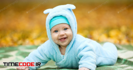 دانلود عکس استوک : نوزاد خندان در پارک Happy Baby Boy In Autumn Park