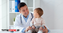 دانلود عکس استوک : کودک و پزشک Happy Doctor Or Pediatrician With Baby A Clinic