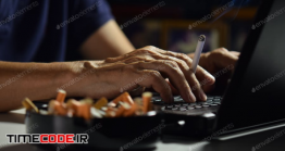 دانلود عکس استوک : سیگار کشیدن در هنگام کار با کامپیوتر Man Holding Lit And Smoking Cigarette