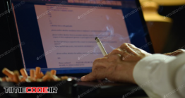 دانلود عکس استوک : سیگار کشیدن هنگام کار با کامپیوتر Man Smoking Cigarette And Working On A Laptop Computer