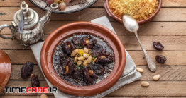 دانلود عکس استوک : خورشت تجین مراکشی با خرما Moroccan Tajine Of Beef With Dates And Almongs