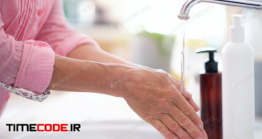 دانلود عکس شستشو دست  Unrecognizable Woman Washing Hands At Home