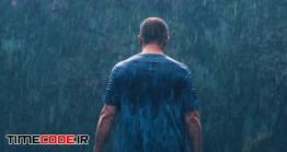 دانلود فوتیج مرد زیر باران A Soaked Man Walks Away Into A Heavy Rain