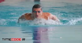 دانلود رایگان فوتیج ورزشکار در حال شنا پروانه در استخر The Sportsman Swimming Butterfly In The Blue Water