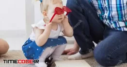 دانلود عکس دختر بچه با عینک فانتزی Cute Baby Girl Playing Indoors