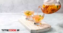 دانلود عکس قوری با چای و نعناع Homemade Fruit And Berry Tea With Mint