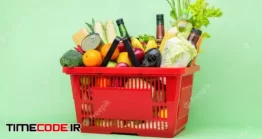 دانلود عکس سبد خرید سوپرمارکت Colorful Food And Groceries In Red Supermarket Plastic Basket