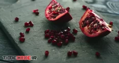 composed halves of ripe pomegranate with bright 20091 49 46 839