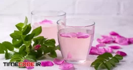 دانلود عکس لیوان آب با گل برگ های رز صورتی Pink Rose Water, Summer Healthy Drink