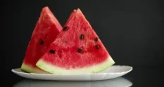 pieces of fresh ripe red watermelon on a wooden 38974193 cover 1