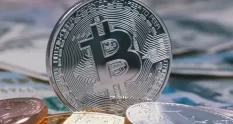 silver bitcoin coin btc and bills of dollars are r 31305 cover 1