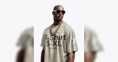 man wearing a t shirt with gold chain and 136554 cover 1