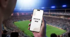 man football match holding phone mockup 62295684 cover 1