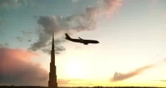 silhouette of a plane landing from dubai 40002 cover 1